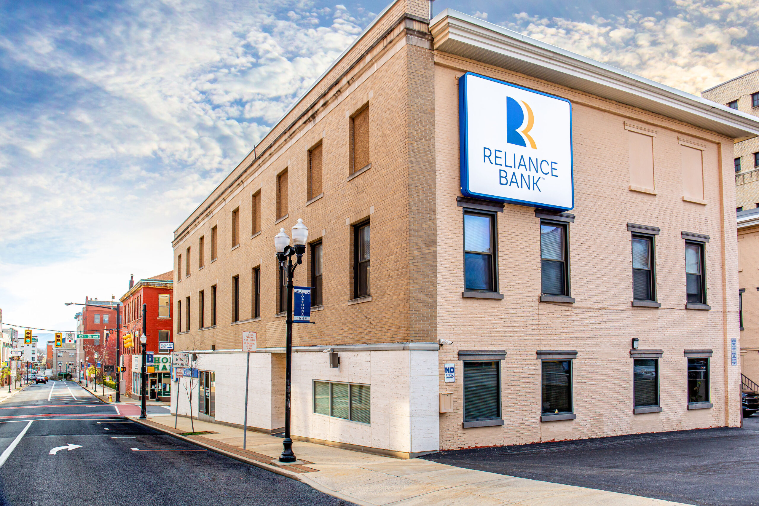 brick building serving as reliance bank headquarters